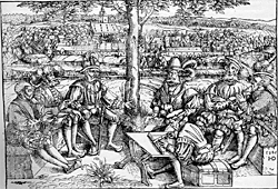 Kriegsrat zur Zeit des schmalkaldischen Krieges, Holzschnitt 
Reinhart des lteren, Graf zu Solms und Herr zu Mntzenberg war Generalfeldmarschall Kaiser Karl V., 1546; 
Quelle: Kriegsbuch des Reinhart des lteren, Graf zu Solms und Herr zu Mntzenberg von 1549; eingescannt aus: Otto Henne am Rhyn: Kulturgeschichte des deutschen Volkes, Zweiter Band, Berlin 1897; Wikipedia Commons